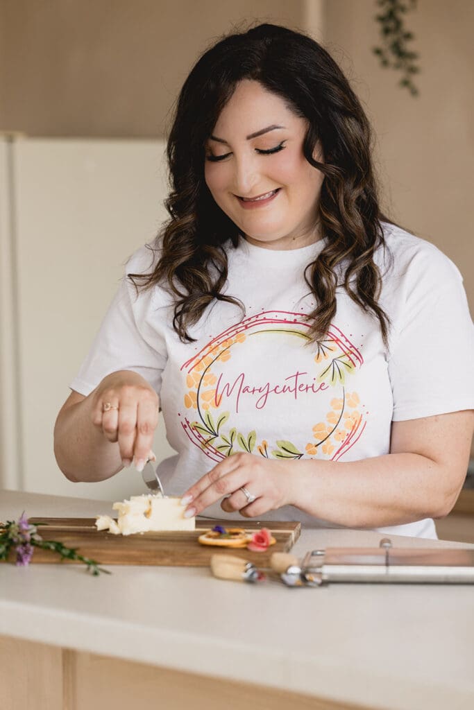 Mary, founder of Marycuterie, creating a charcuterie board in Kitchener-Waterloo and Elmira