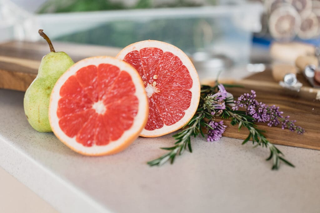 Close up of fruit and herbs styled by Marcuterie during a branding photoshoot by Portraits by Kendra in Kitchener-Waterloo