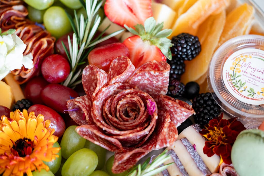 Close-up of a prosciutto flower in a charcuterie board made by Marycuterie of Kitchener-Waterloo and Elmira